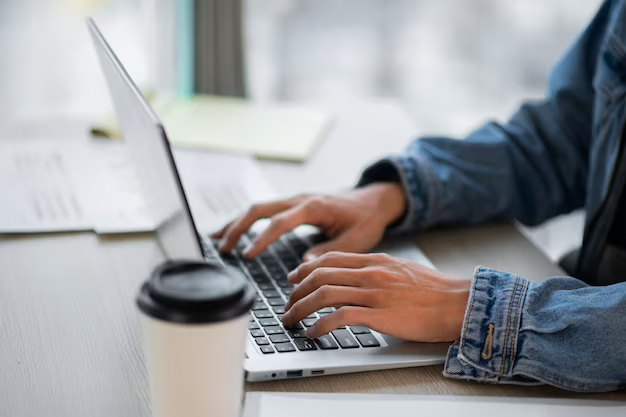 A man works on a computer