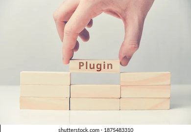 Image of wooden rectangles being stacked, with one rectangle labeled 'plugin'